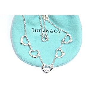 Tiffany & Co. Elsa Peretti®
Open Heart Silver Heart Charm Necklace